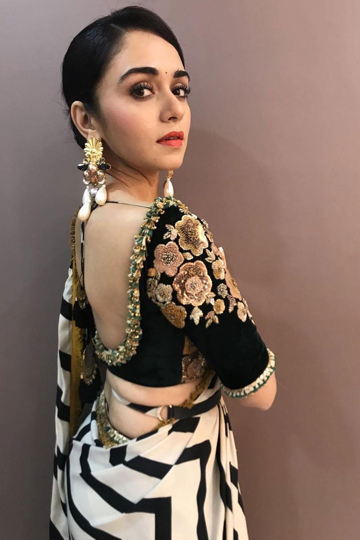 AMRUTA KHANVILKAR IN THE CHEVRON STORY