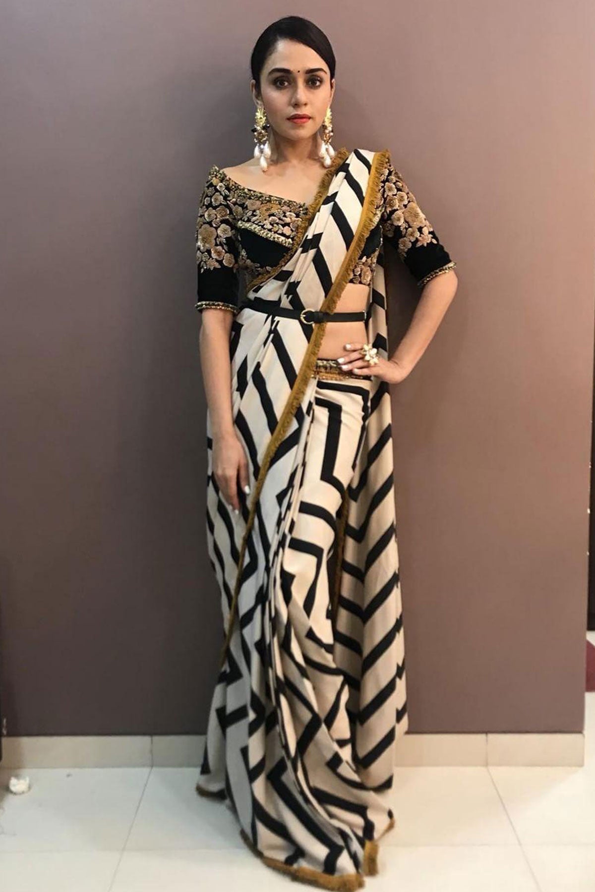 AMRUTA KHANVILKAR IN THE CHEVRON STORY