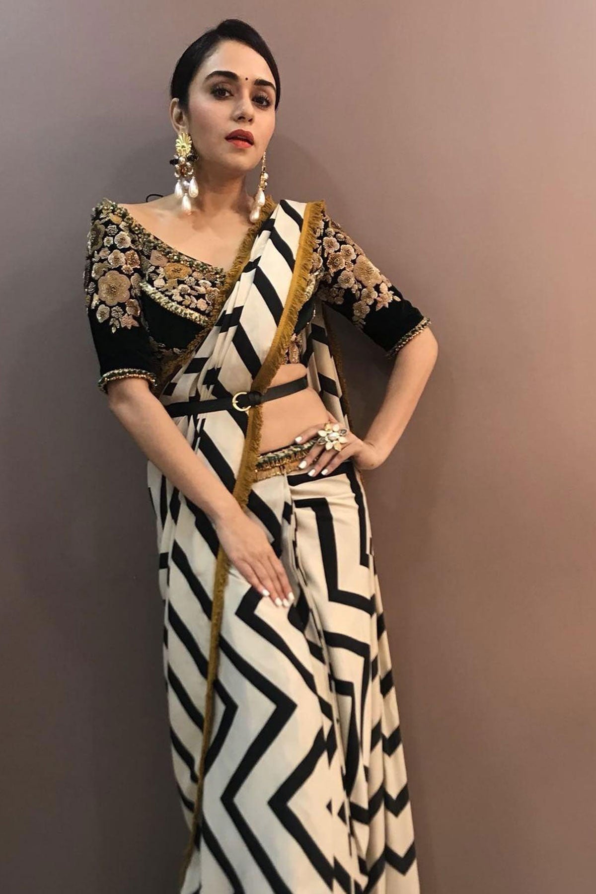 AMRUTA KHANVILKAR IN THE CHEVRON STORY