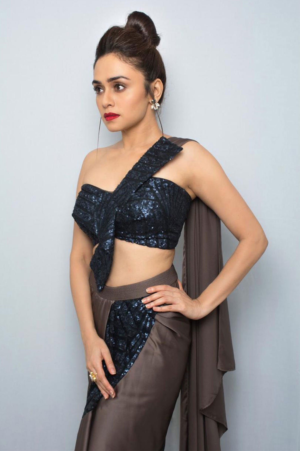 AMRUTA KHANVILKAR IN STRUCTURED BOW CORSET WITH A DRAPED SKIRT